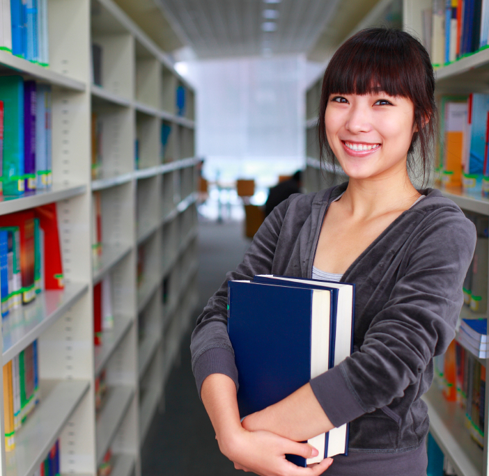 Asian-student-holding-books